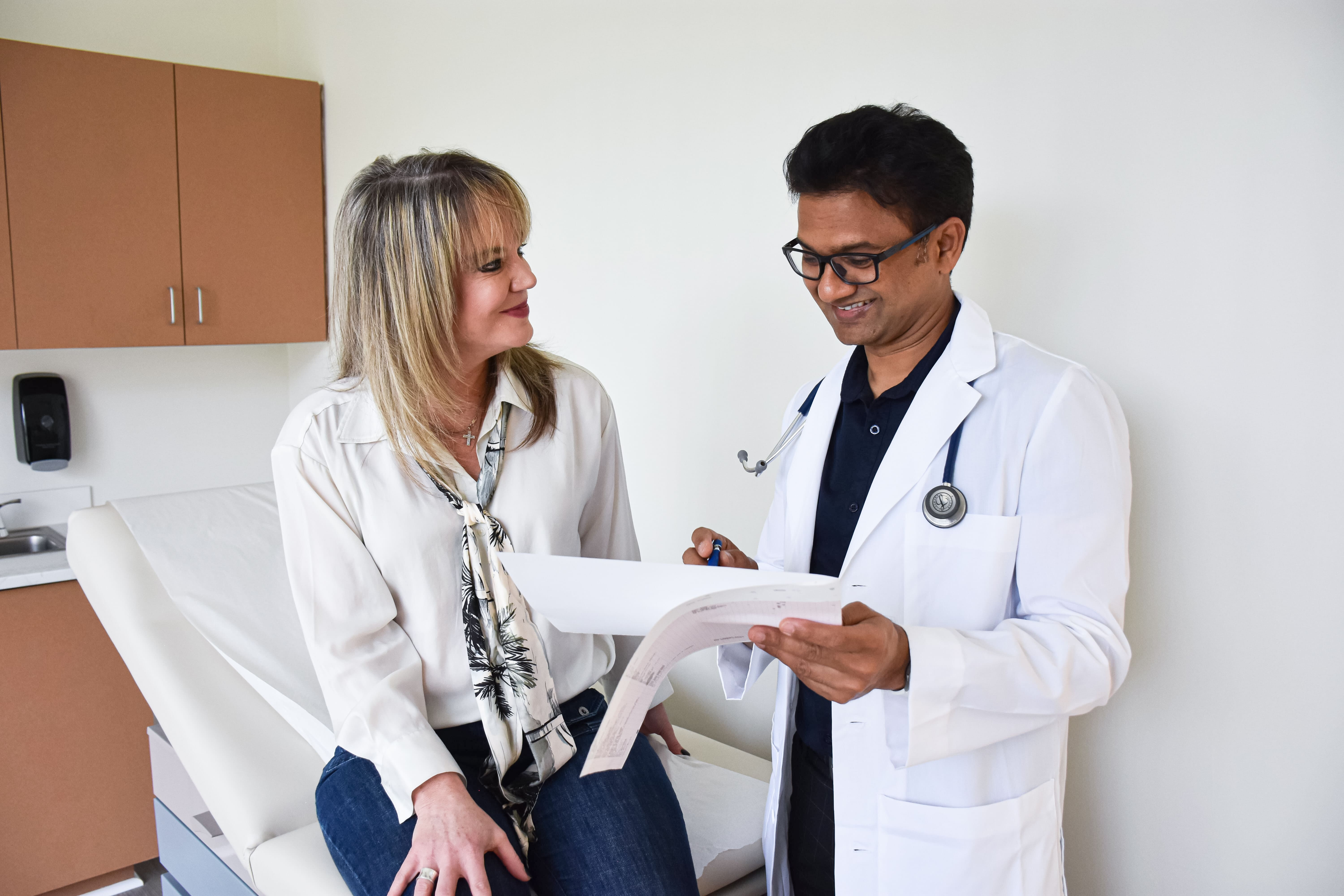 woman talking with doctor